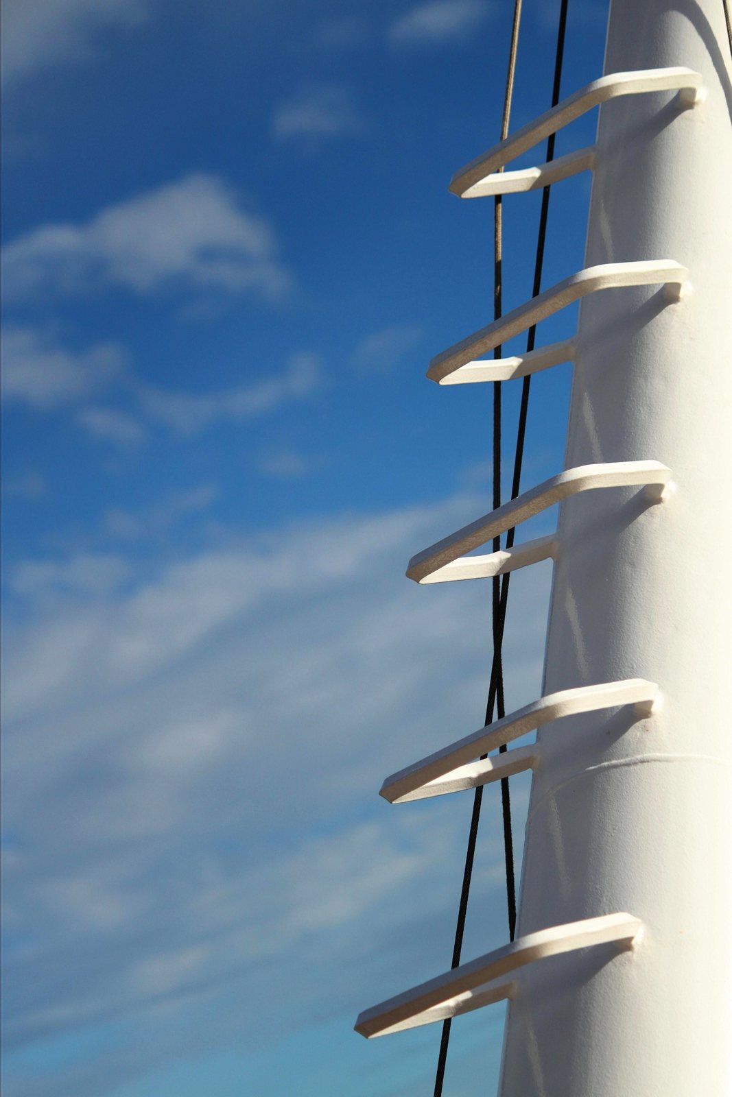 Mast ladder against a blue sky